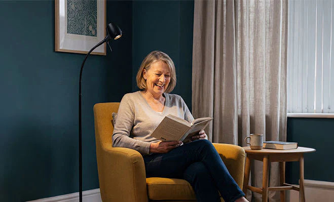 Woman reading with HD floor light