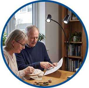 Couple reading with Gemini floor light