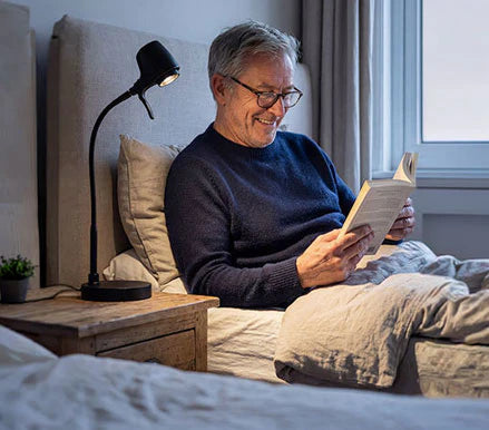 Man Reading with HD Table Light