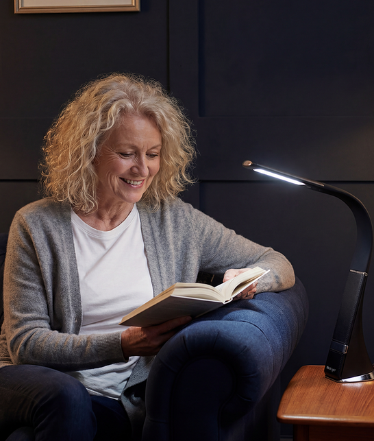 Woman reading with HD Roam light