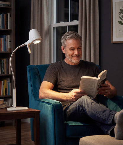 Man reading with HD Original table light