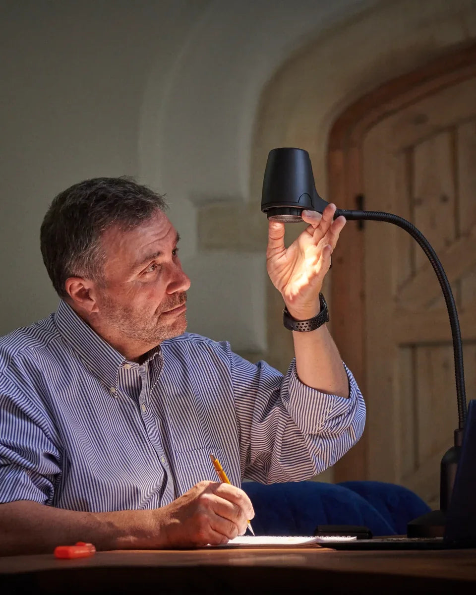 Alex Pratt examining a Serious light